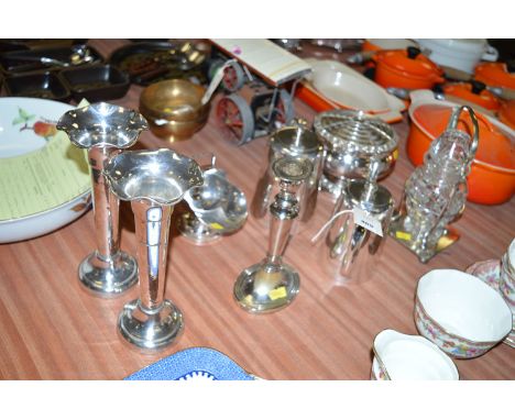 A pair of plated Walker & Hall spill vases; scuttle; candlestick; two graduating water jugs; jardiniere, a pickle jar and sta