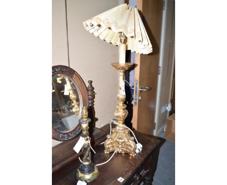 A modern moulded gold painted table lamp with pleated shade; and an early 20th Century papier mache table lamp with painted d