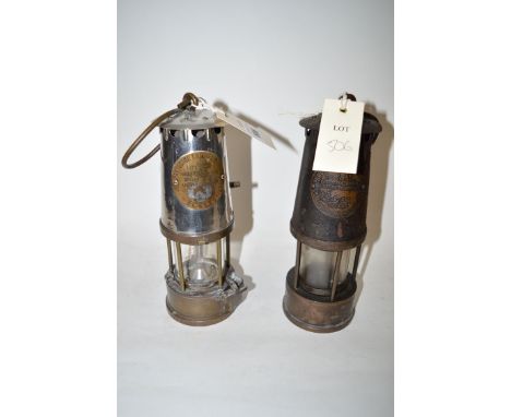 A Protector Lamp & Lighting Co. Type GRS miner's lamp, with polished steel bonnet; together with another Protector Lamp & Lig