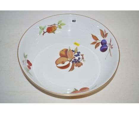 A large circular Royal Worcester 'Evesham' pattern fruit bowl, decorated with various sprays of fruit.