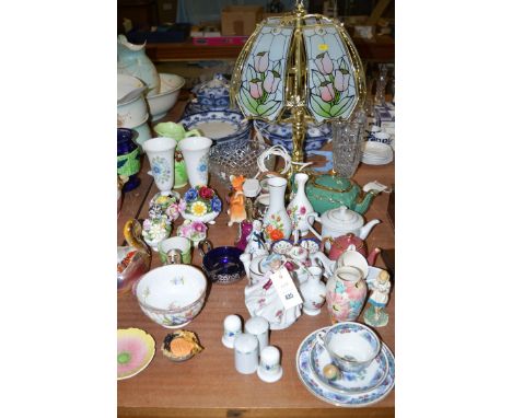 A modern table lamp with floral glass shade; a crystal bowl; and a quantity of china ornaments.