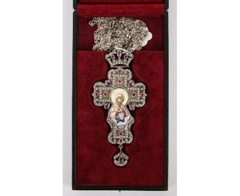 White metal crucifix, marked 925, the central enamel plaque surrounded by semi-precious stones 15 x 8cm 