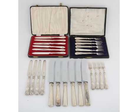 Six 800 standard silver handled large knives, set of six silver handled tea knives, six silver handled forks and a set of fou