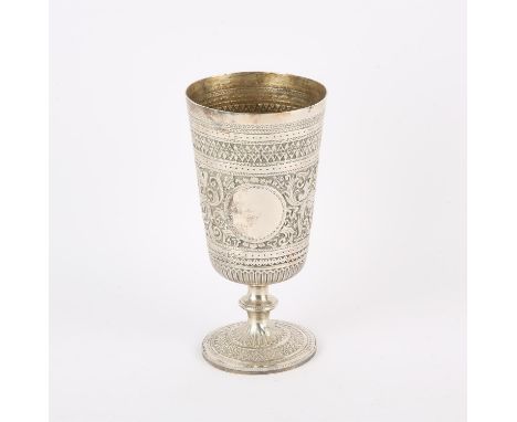 Victorian silver pedestal cup, moulded with bands of scrolling foliage and birds around a vacant cartouche, marks for John Al