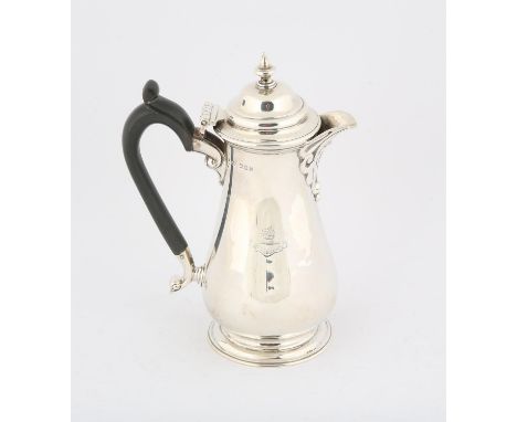 George V coffee pot of baluster form, engraved with an armorial and motto "Dum Spiro Spero", by Harrison Brothers & Howson, L