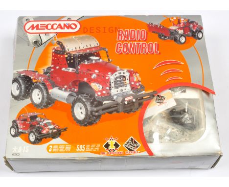 Meccano Design Radio Control Set. Comes with parts to construct 3x vehicles, instruction manual, all contents are unchecked. 