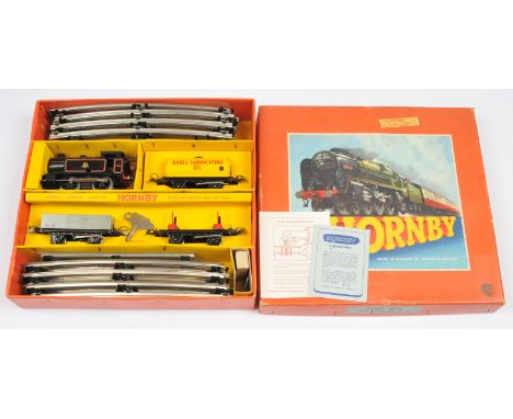 Hornby O Gauge No.45 Post-War Goods Set. With an 0-4-0 Tank Loco BR black No.82011, clockwork together with No.50 Goods Wagon