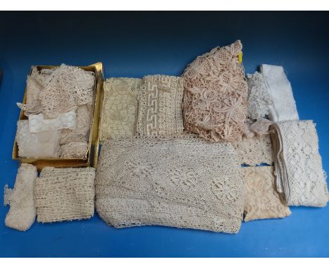 A box of approximately forty rolls of vintage ribbon together with a box of mainly 19thC lace