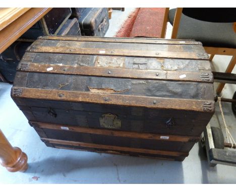 A vintage dome topped travelling trunk (W83 x D50 x H59cm)