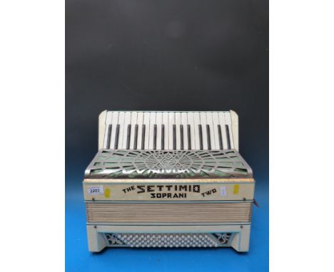 A Settimio Soprani Two 80 bass piano accordion, in ivory pearloid finish with case