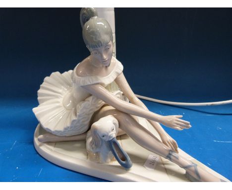 An M. Requena lamp of a ballerina and dog beside a column 