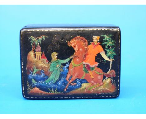 A Russian Palekh lacquer box decorated with a man on horseback, a mermaid and a castle (signed K Kuznetsaya)