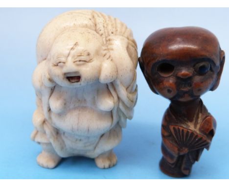 A Japanese ivory netsuke of Hotei together with another boxwood netsuke