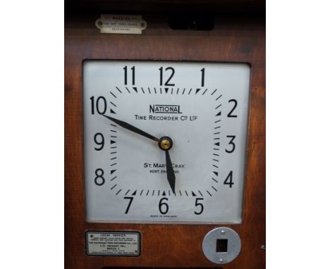 A National Time Recorder Company clock-in machine with mechanism for clocking in and out