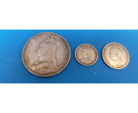 A Queen Victoria 1887 Jubilee crown together with a sixpence of the same vintage and a George IV second head shilling