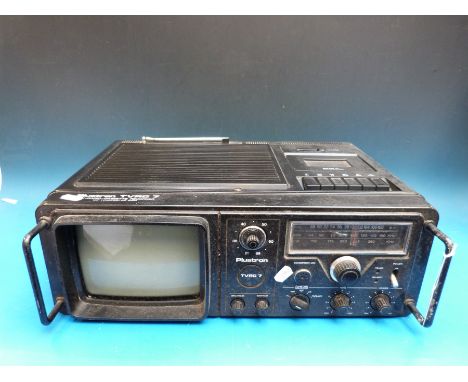 A c1970's vintage Plustron TVRC7 portable television, radio, cassette recorder with VHF