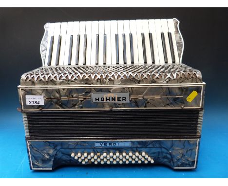 A Hohner Verdi I 48 bass piano accordion, in grey pearloid finish with case 