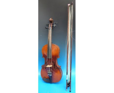 A late nineteenth or early twentieth century probably Tyrolean made violin, the two piece 36cm back impressed Stainer, the ed