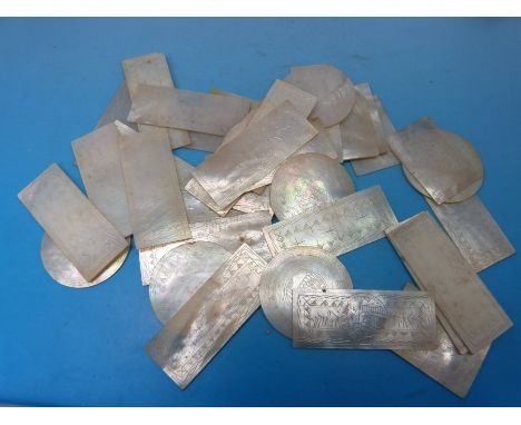 Thirty-seven Chinese mother-of-pearl gaming counters of square, rectangular and circular form, each with carved decoration