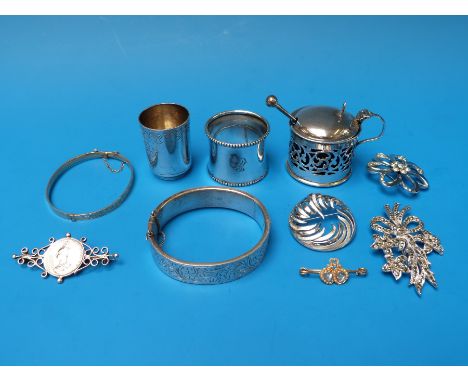 A hallmarked silver napkin ring, silver bangle and a mustard (weight 69g) together with a white metal shot glass with Russian