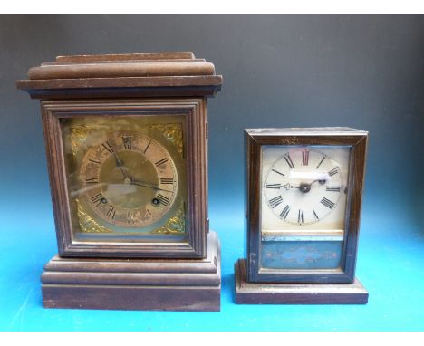 A walnut cased Ansonia mantel clock together with a Teutonia German example