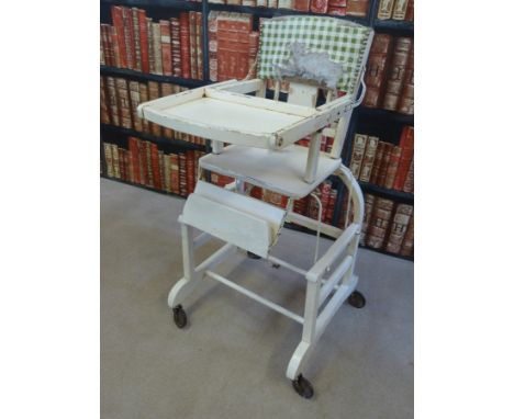 A vintage metamorphic highchair
