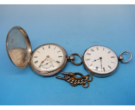 A full hunter silver cased pocket watch, slightly smaller than usual (4.5cm diameter), the case engine turned, together with 