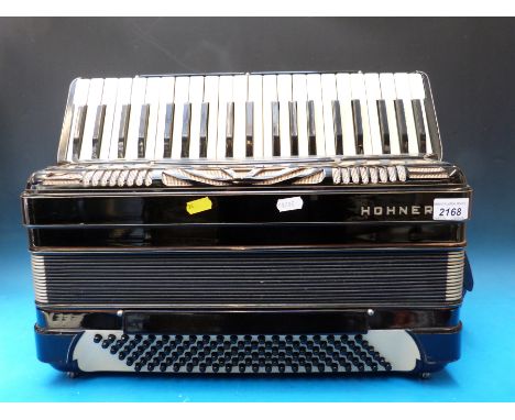 A c1960 120 bass Hohner piano accordion, two treble and two bass couplers, in black finish