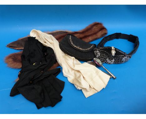 Two pairs of circa Edwardian silk stockings, a sequinned 1920's head wrap evening purse and fur stole and two vintage tin bab