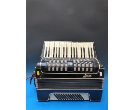 A 'Stark' 60 bass c1960 piano accordion, in gloss black finish (with case)