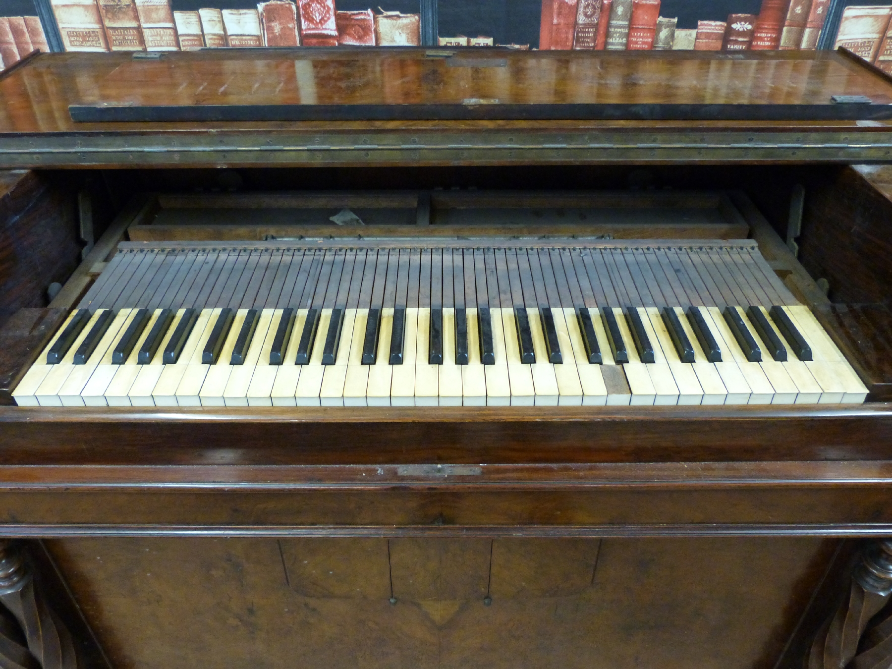 A c19th walnut cased reed organ/harmonium with foot pedal operated