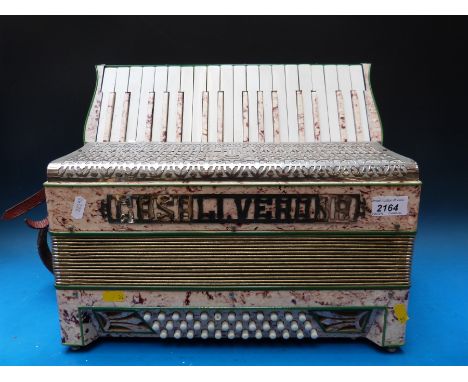 A Casali Verona 36 bass Italian piano accordion in pink onyx finish with matching stamps to keyboard, embellished in green ba