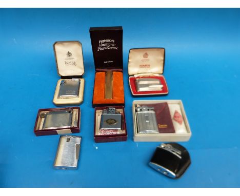A collection of vintage Ronson lighters, mostly cased or boxed, some with original leaflets and cleaning equipment