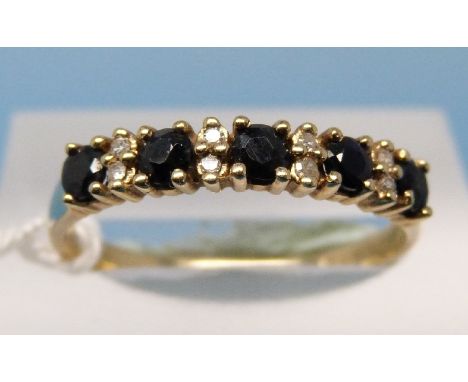 A 9ct gold diamond and sapphire ring (size P)