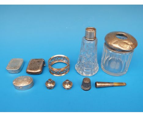 A hallmarked silver vesta case, white metal patch case, silver thimble, napkin ring etc