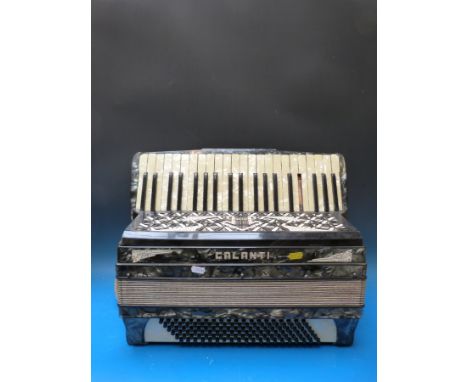 A Royal Standard 24 bass piano accordion, in white finish (with case), together with a Galanti 120 bass accordion, in grey pe