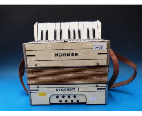 A Hohner 8 Bass child's or students piano accordion, in ivory pearloid finish (with case)