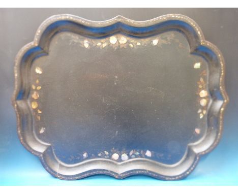 An exceptionally large shaped mother of pearl inlaid papier maché tray (length 80cm) 