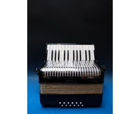 A Bell 12 bass piano accordion in black finish, with case