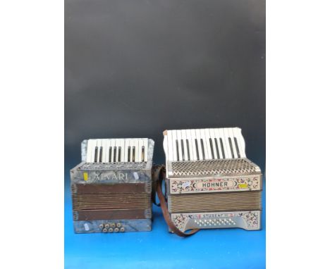 A 24 bass Hohner Student III piano accordion cased together with an 8 bass Alvari example