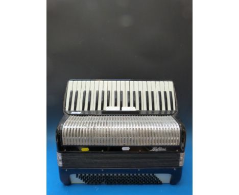A c1960 Italian 120 bass piano accordion by Bellini, in black gloss finish