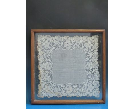Two Victorian handmade lace doilies in glazed frames together with a framed sampler, dated 1943