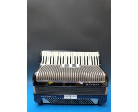 A c1980s Hohner Carena IIIM 120 bass piano accordion, in black finish (overhauled by Ivor Hyde, with case)