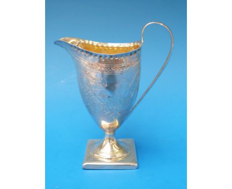 A Georgian hallmarked silver helmet shaped jug with engraved decoration and gilt interior, London 1798 makers mark rubbed pos