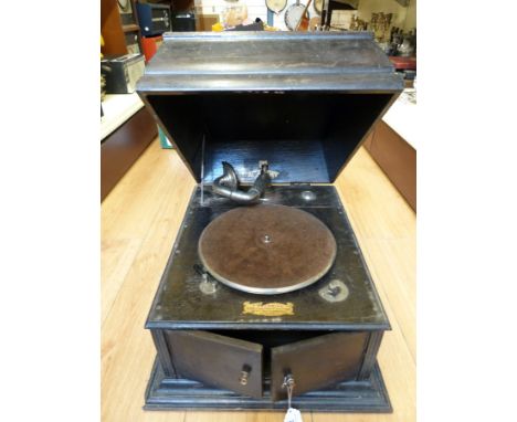 An Academy vintage wind up gramophone with retailer's mark for F W Dunkley, Bristol