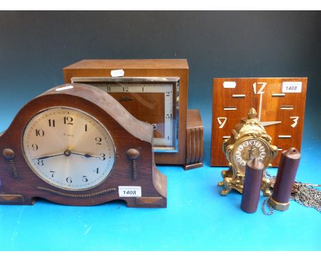 Three c1930s clocks, together with a Louis XV style brass mantel clock