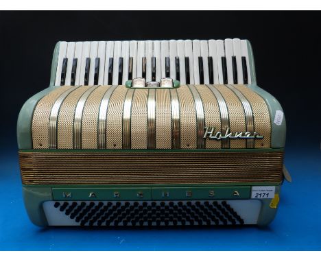 A 120 bass 1950s Hohner Machesa piano accordion in light green finish, three treble couplers (cased)