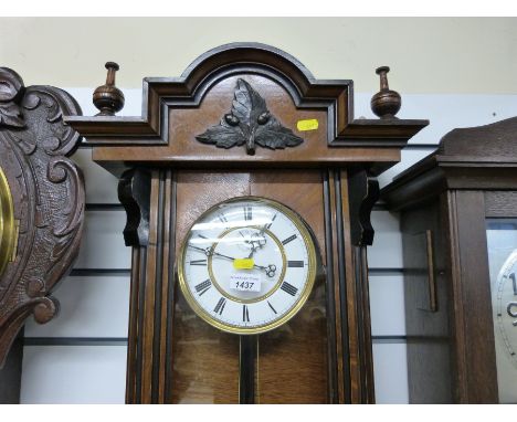 A weight driven timepiece, Vienna regulator c1880 in walnut case with ebonised decoration, the enamelled dial has Roman numer