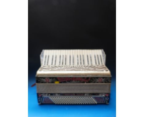 A Scandalli 'Vibrante Four' Art Deco 120 bass piano accordion, in grey pearloid finish with 'sparkly star' embellishment and 