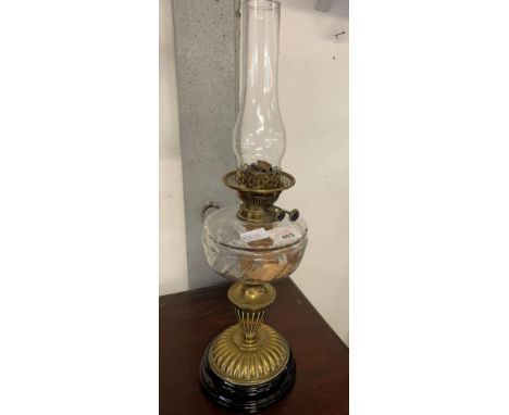 BRASS OIL LAMP ON EBONISED BASE